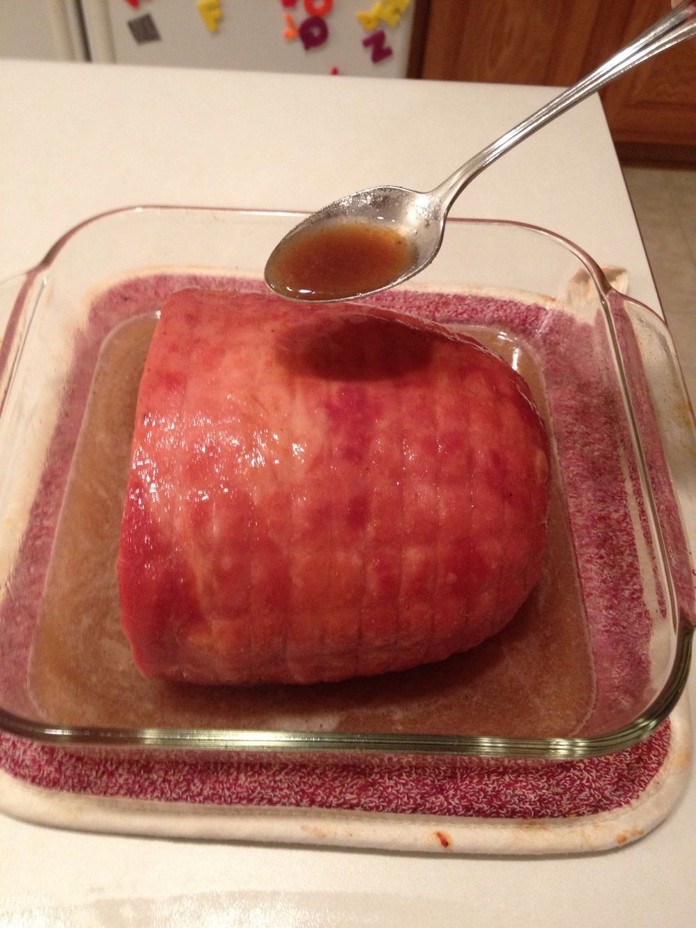 Every 10 minutes, remove ham from oven and baste.