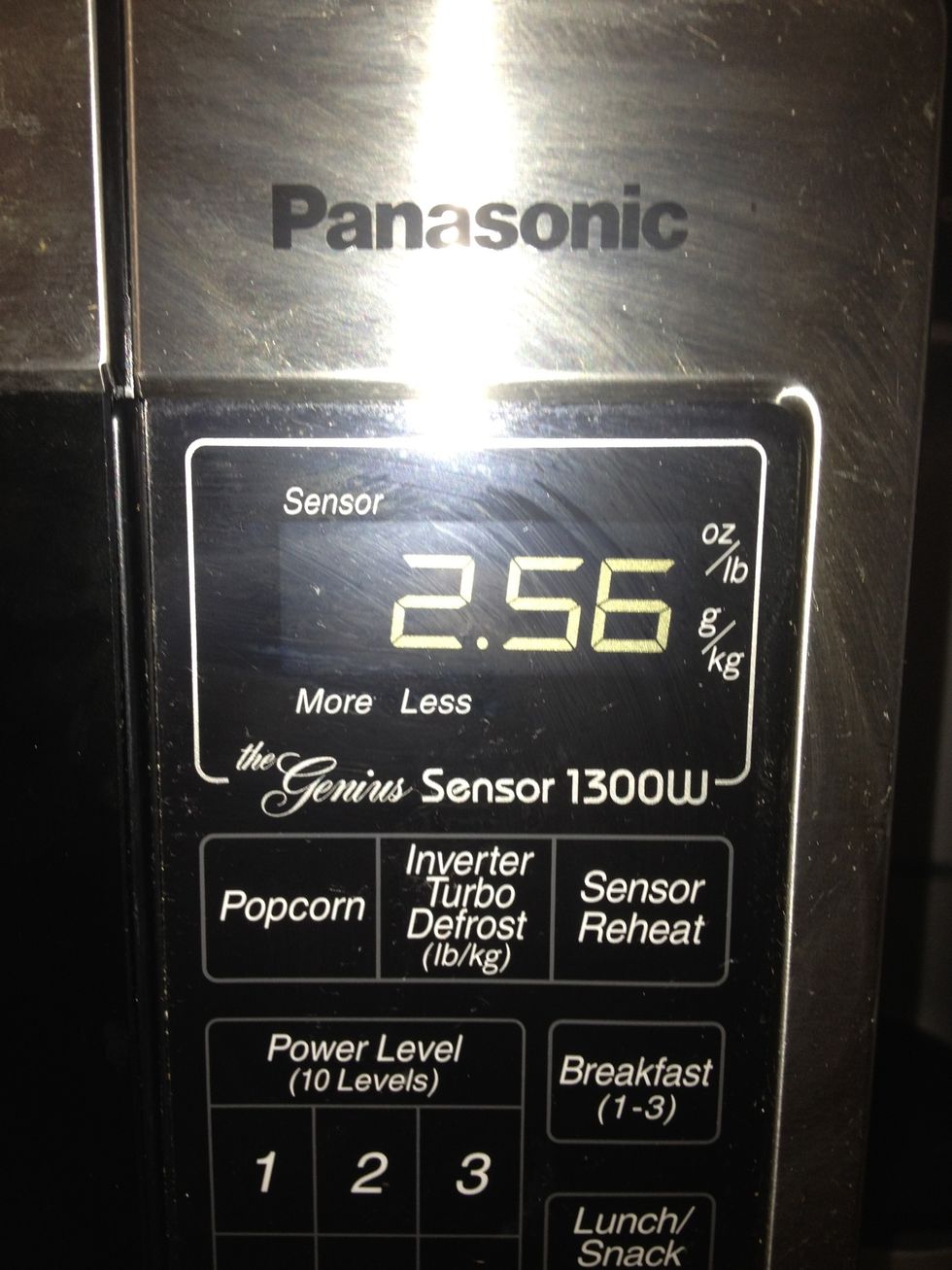 Every microwave is different - I watched and listened until a few seconds between pops, then pulled the bag. In this case, a quick pull.