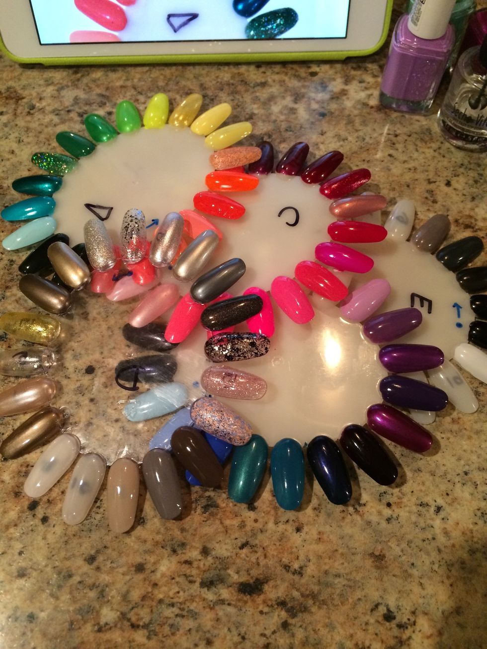 Every wheel, except the glitters, has two coats and a clear top coat. This is typically how many I need on my own nails. The glitters got as many coats needed to make them as close to opaque.