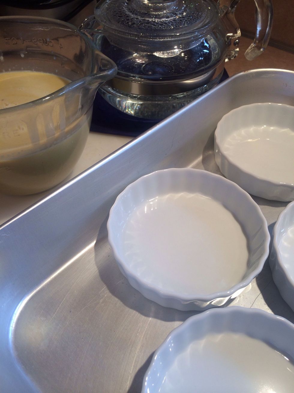 Everything ready...custard, hot water, pan with dishes.