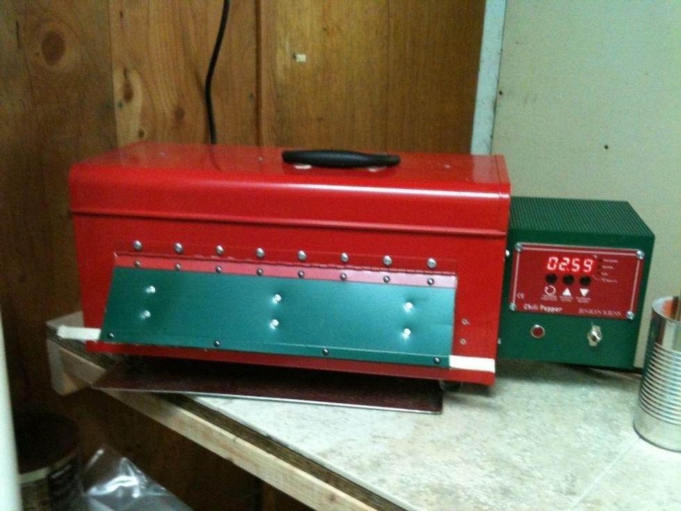 Example of bead maker's annealing kiln (running for 2:59 minutes @ 960 F.) The green flap is lifted & the hot bead/mandrel is laid on fiber blanket inside & left for at least 4-6 hours to anneal.