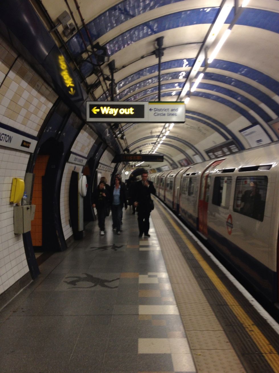 Exit at South Kensington Station. Follow "Way Out, District and Circle Lines" signs.