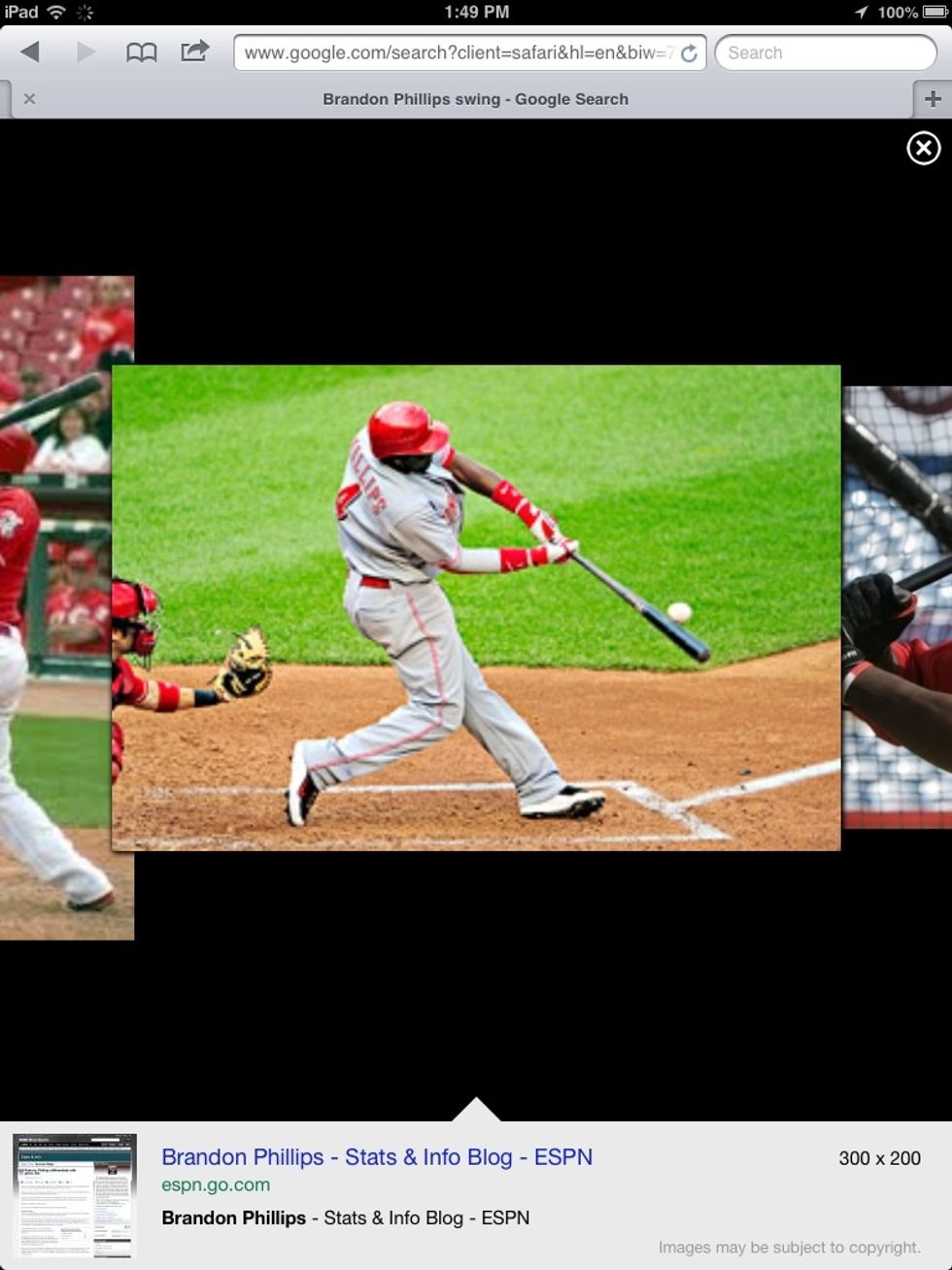 Extend your arms farther, keeping your eye on the ball