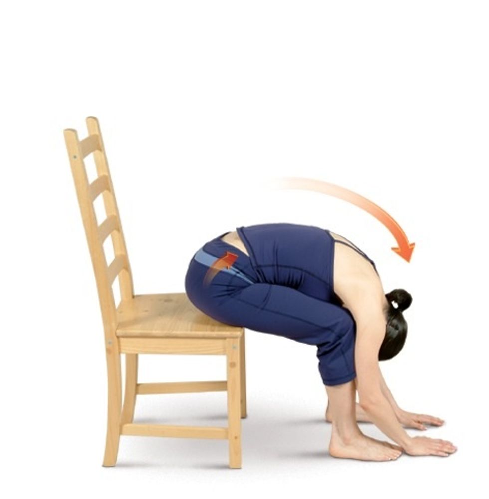 Extend your arms over your head and then bend forward from your hips to move into Chair Forward Bend.