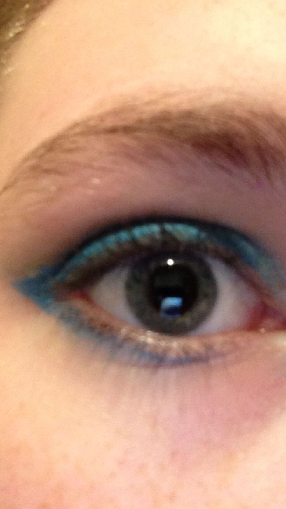 Extend your flick down the bottom lash line as shown