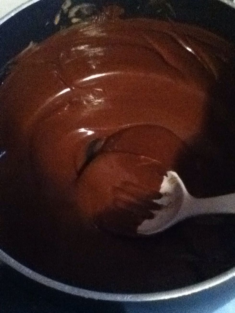 Extract a pot to melt the peanut butter and chocolate chips. Have the stove temperature between three in four. You want it to be low, so it won't burn the substance. Keep mixing until it's smooth.