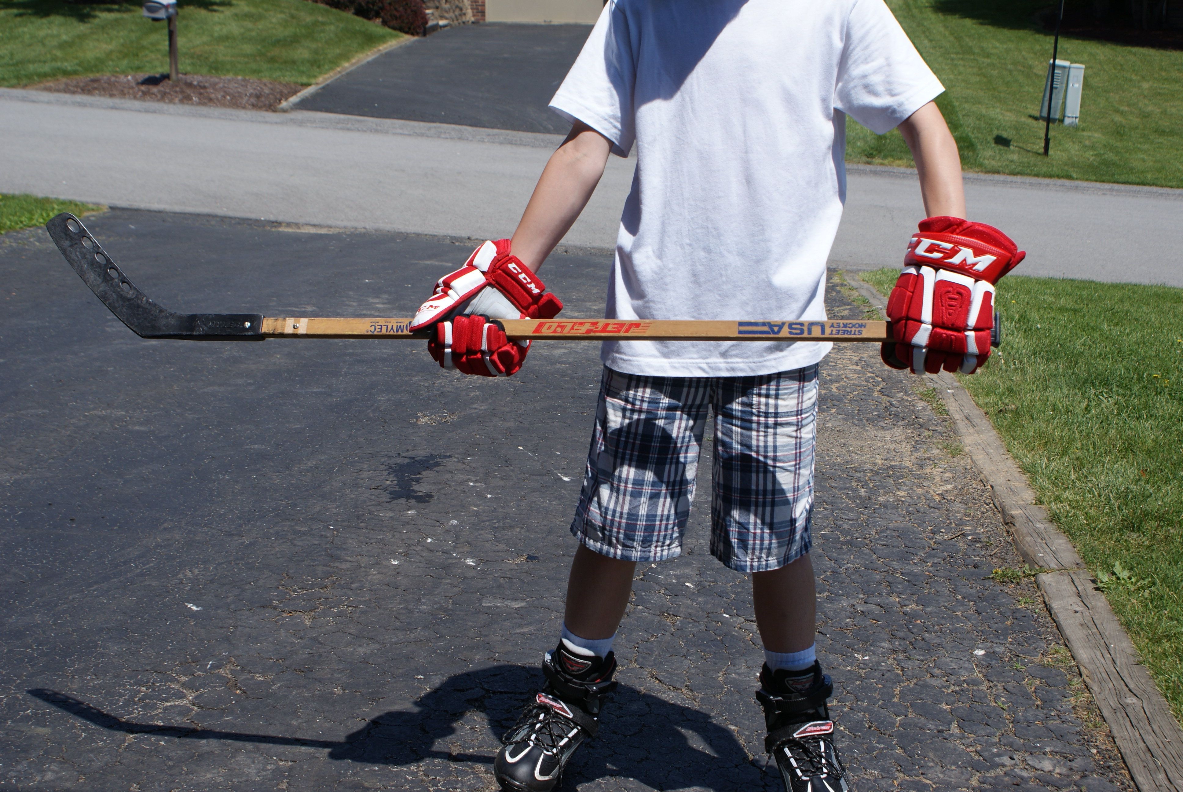 how to hold a hockey stick right handed