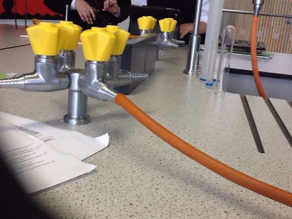 How to set up a bunsen burner by ewan and dylan B+C Guides
