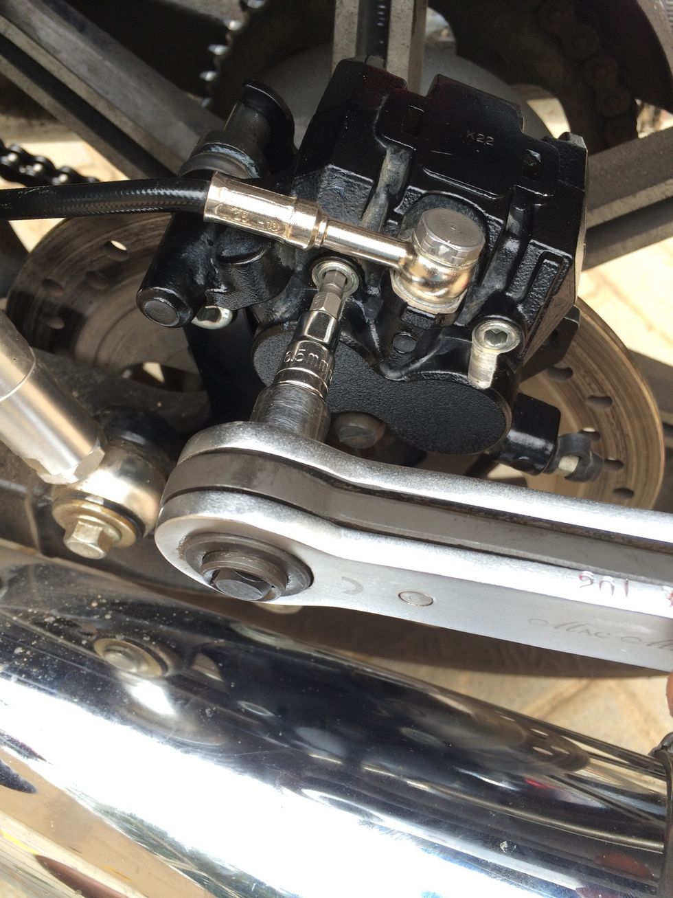 How to change rear brake pads on triumph bonneville B+C Guides