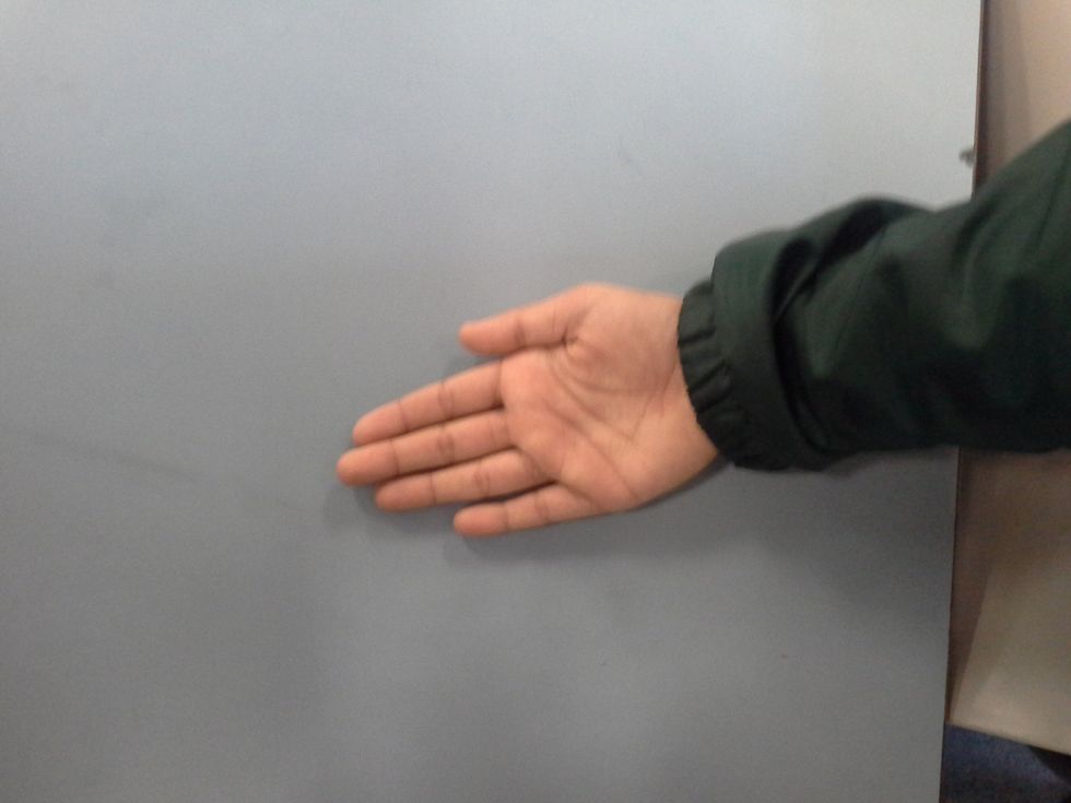 How to do the coin out of the ear trick B+C Guides