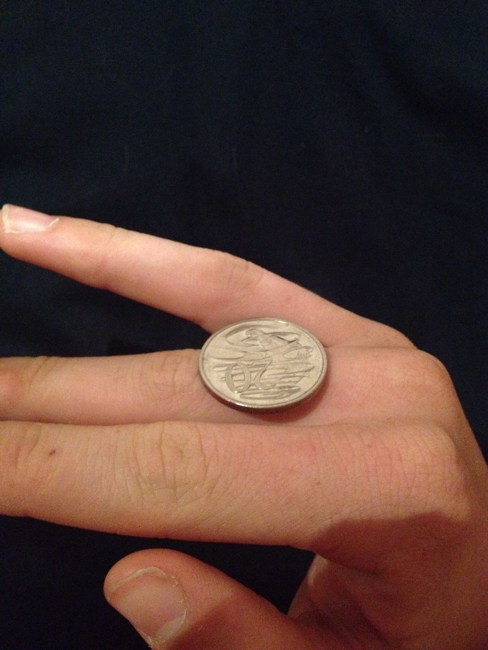 How to roll a coin between your fingers B+C Guides