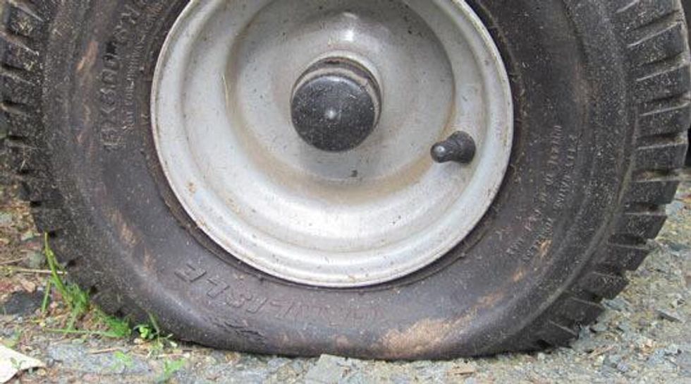 How to check the air pressure in a lawnmower tire. B+C Guides