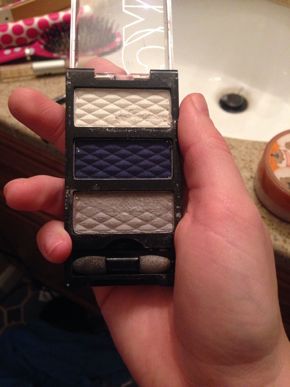 Eyeshadow! I use the bottom silver in this pallet. I think it really brings out the blue in my eyes. I put silver all over the lid, and in by my tear duct I put the white to make it really pop.