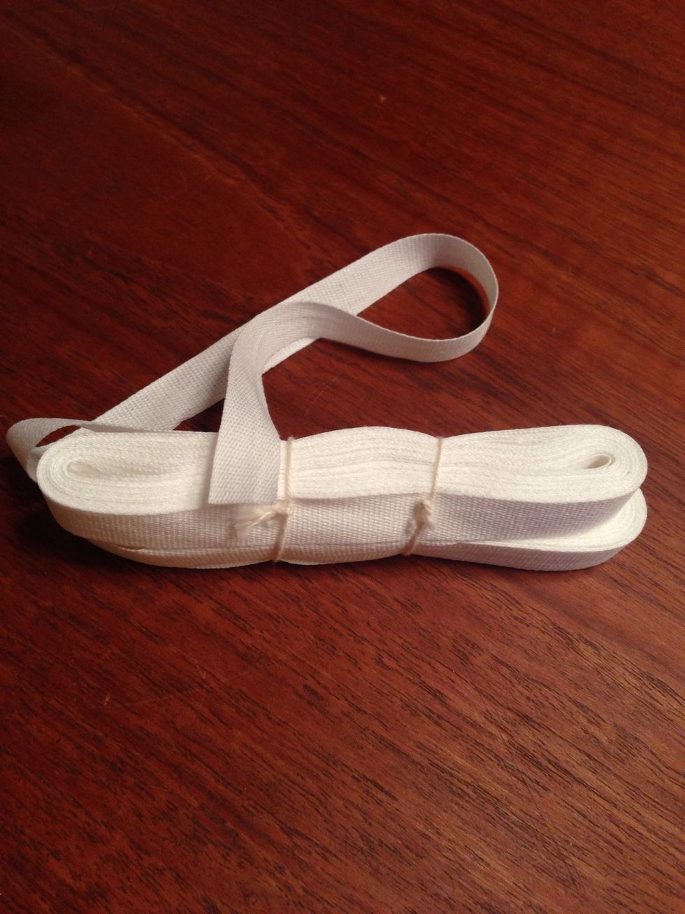 Fabric for hanger. Here it is white which works okay for white or other light colors. However choose color depending on the color of the towel or your taste.