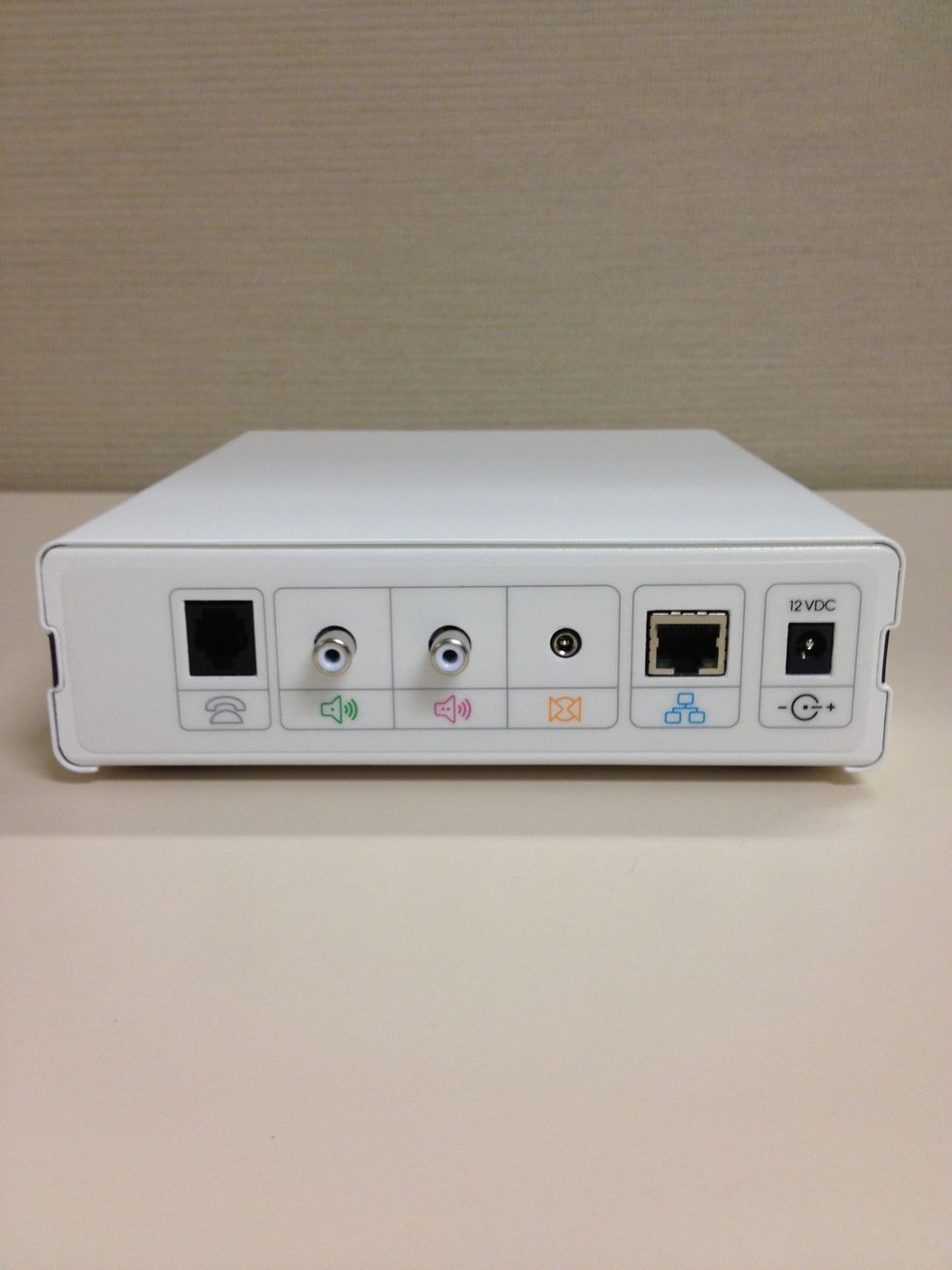 Familiarize yourself with the rear panel. From left to right are the Modem, First Audio Zone, Second Audio Zone, Audio Input, Network, Power.