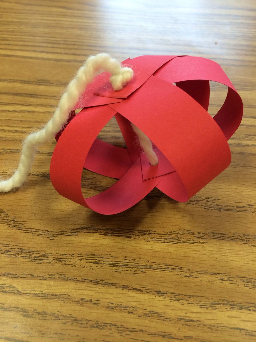 Fan the strips into a globe shape.