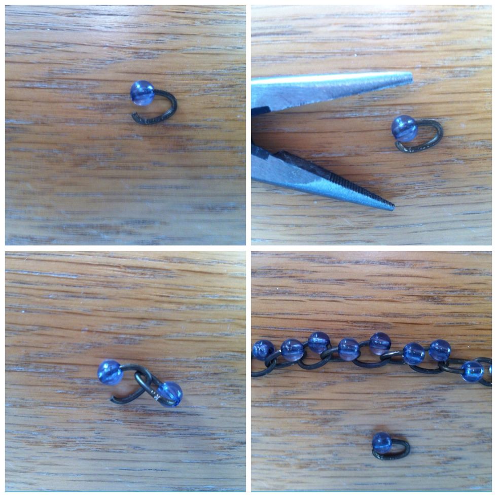 Feed a bead on each link, you can put it all the way through or leave it just at the end and close the bead to old it in place.