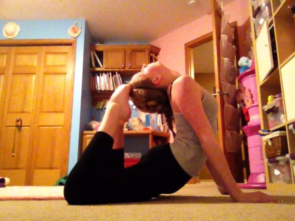 Feet on head: lay on your stomach, bend your legs and head back to touch each other. (this stretch takes time to get your feet to your head)