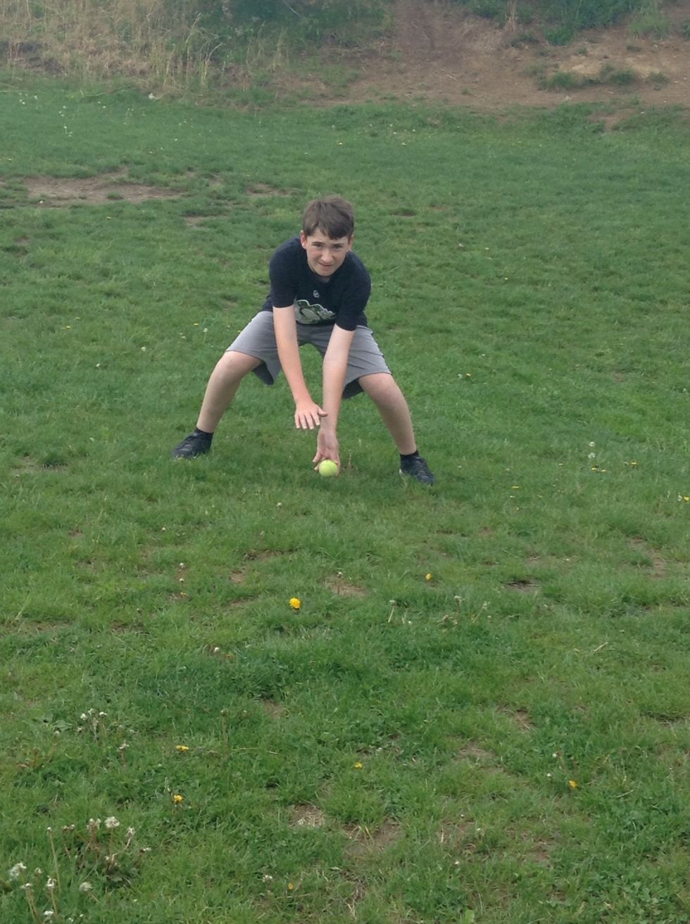 Field the ball out in front of you