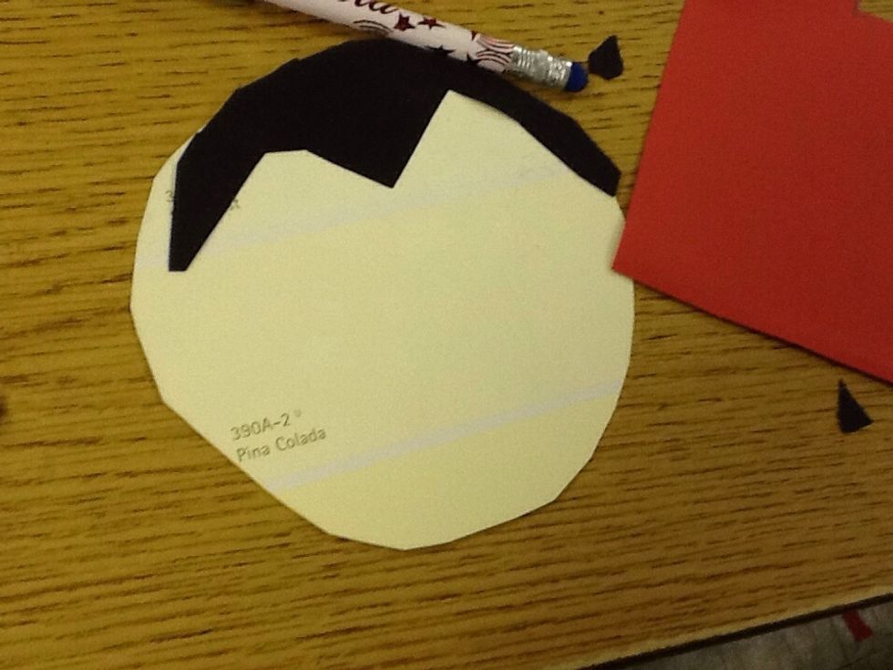 Fifth  glue  the hair on the top of the paper