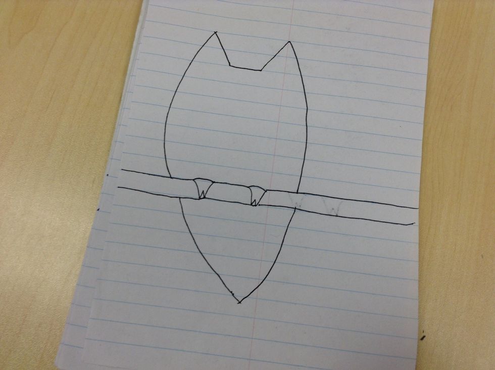 Fifth, make two diagonal line down and a line across to make owl ears.