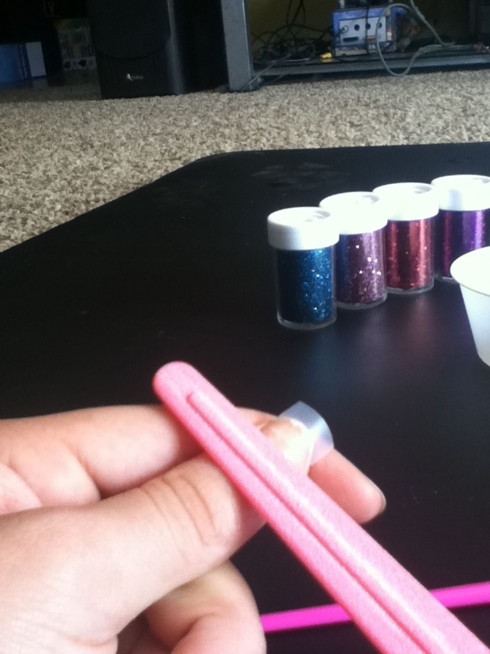File down so tape line blends in with your nail