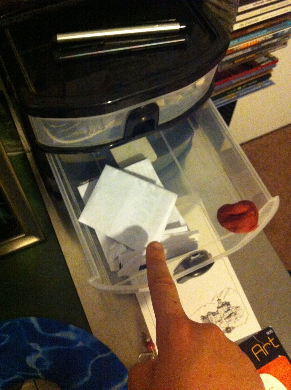 File important papers away for later reading.
