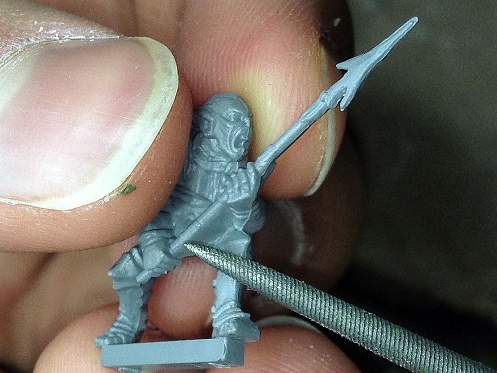 File the mould-lines on the rest of the miniature until they can be neither seen nor felt. A file like the one shown here works well for this job.