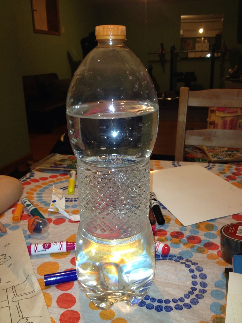 Fill 3/4 of the way with water to leave room for shaking it up later.