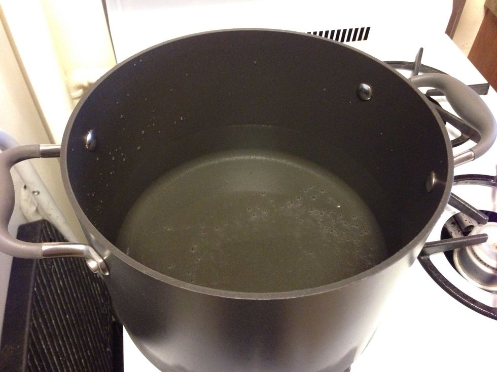 Fill a 6 qt pot halfway with water and turn heat to high