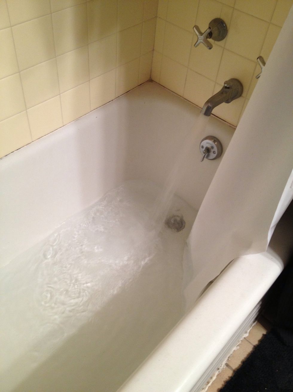 Fill a bucket, deep sink or bath with cold water.