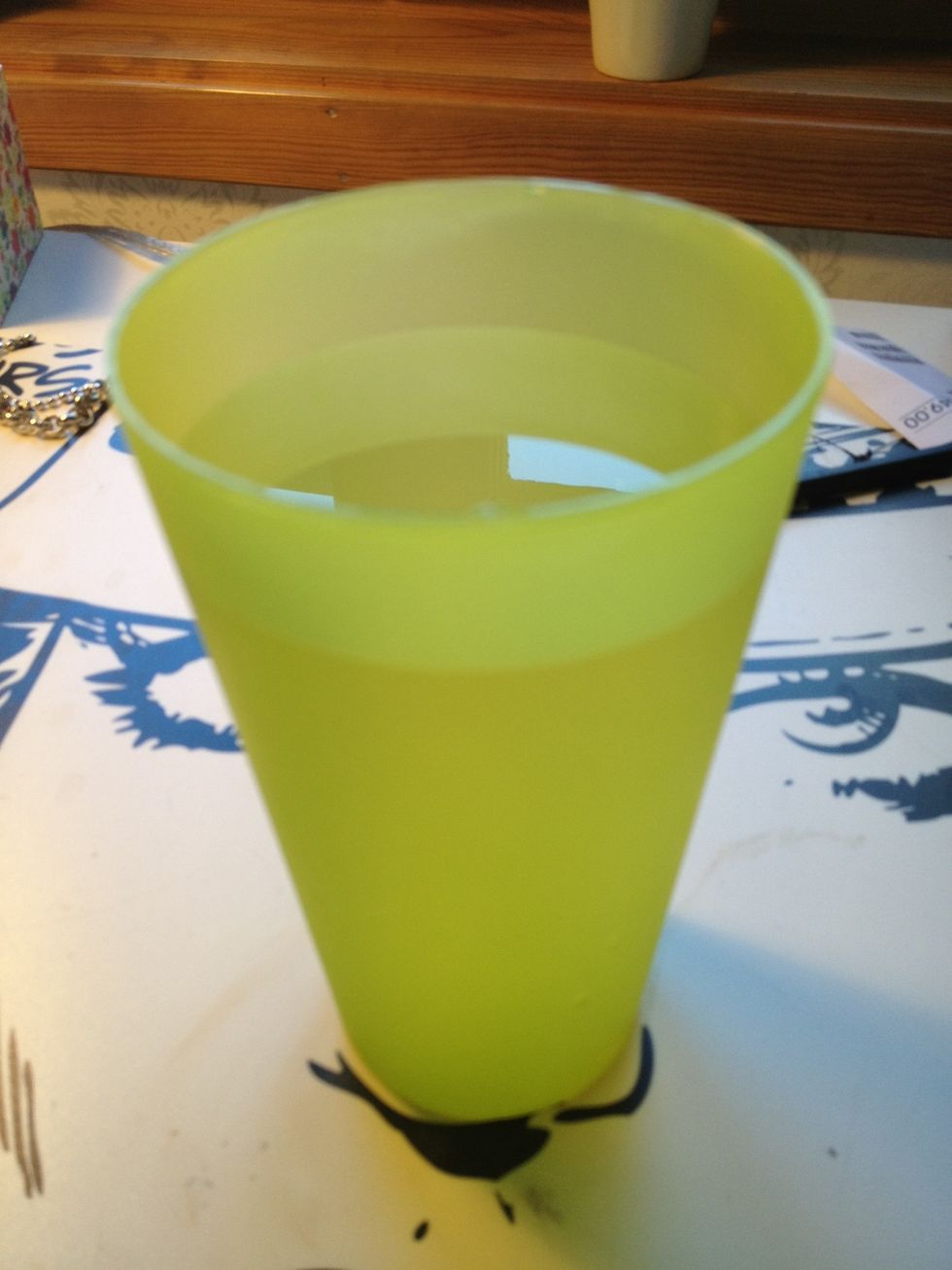 Fill a cup with cold water