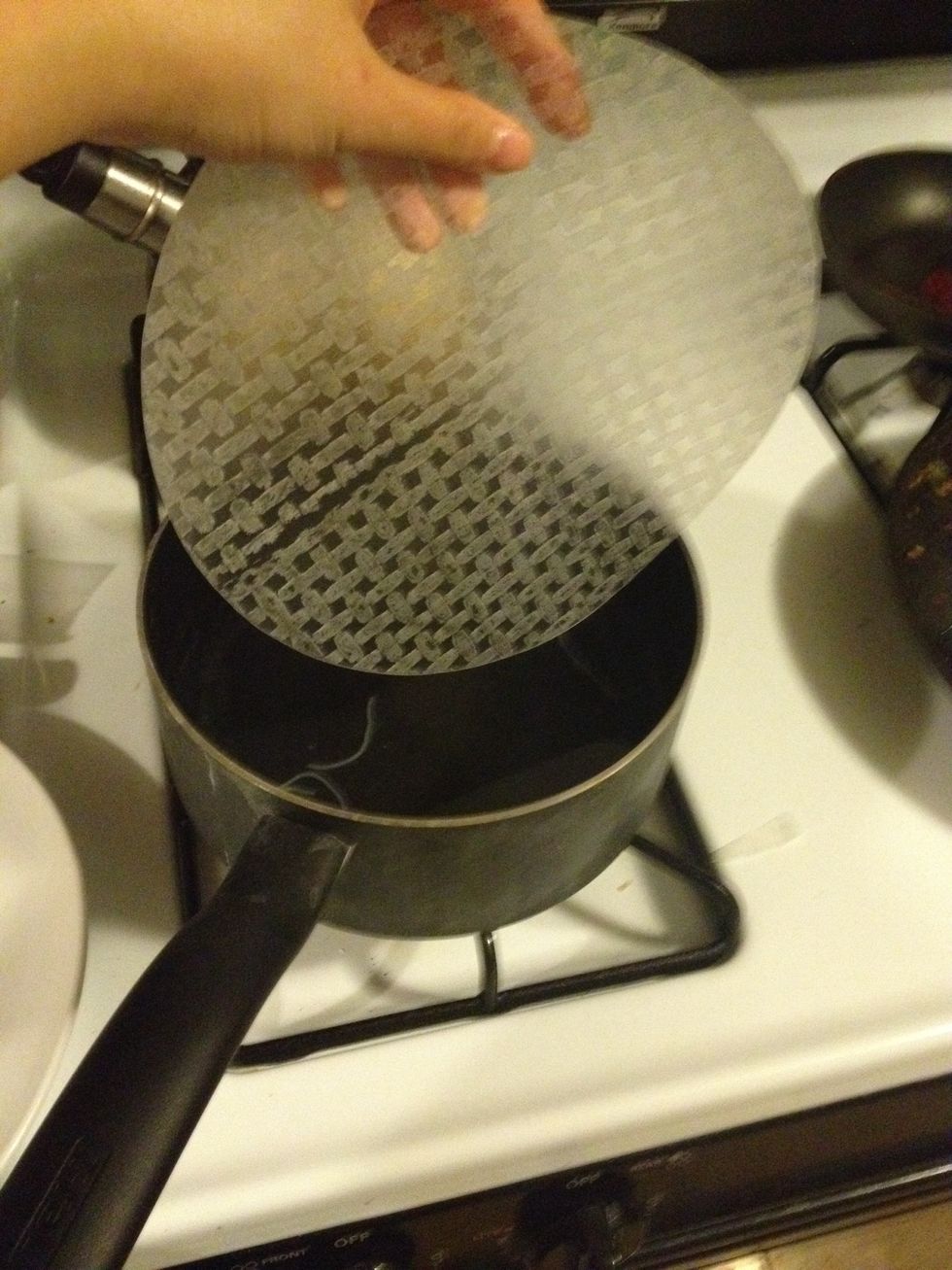 Fill a large bowl with warm water or just dip one wrapper into the hot water for 1 second to soften.
