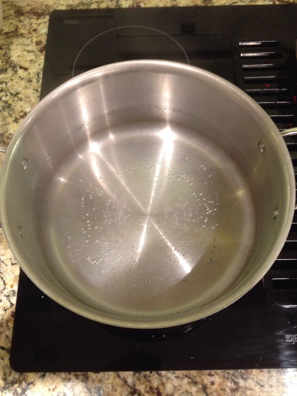 Fill a large pot halfway with water and bring to a boil.