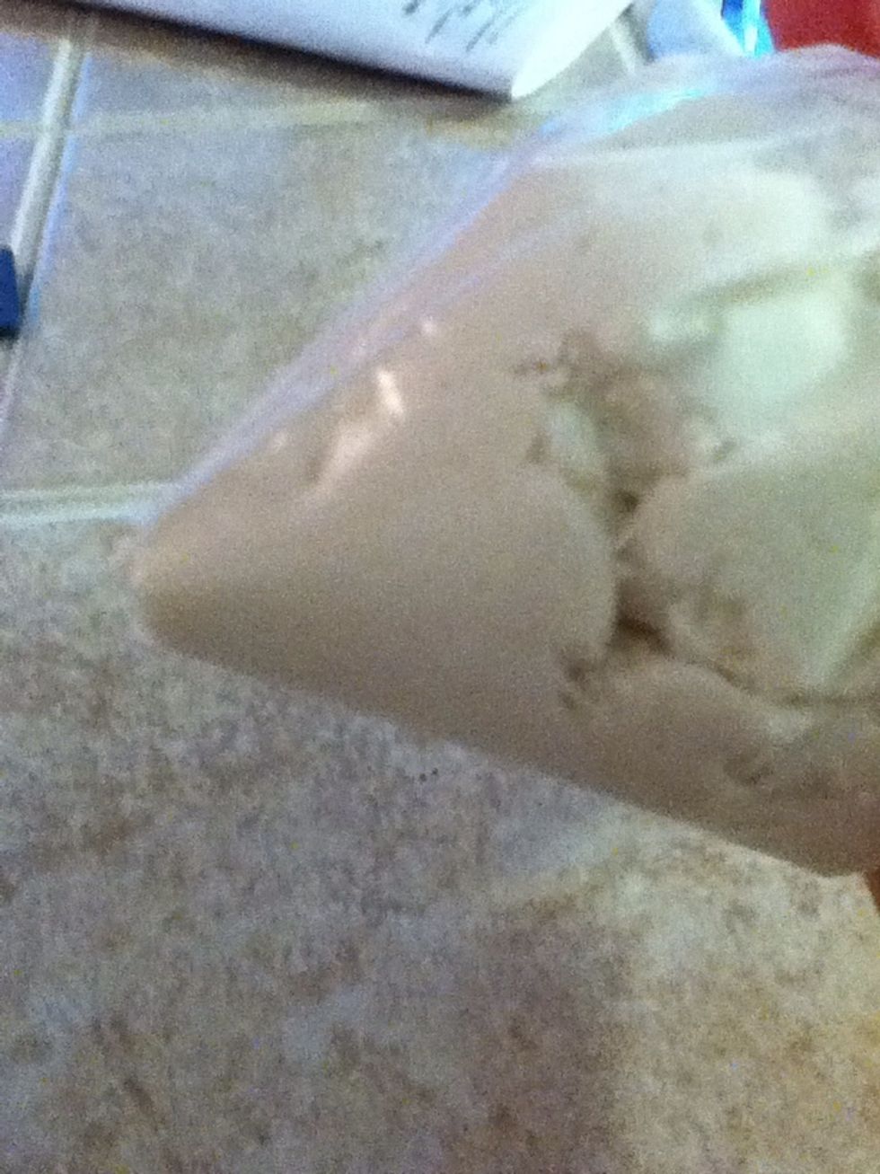 Fill a pastry bag with a large plain tip or a freezer bag with a corner snipped off like I'm using here.