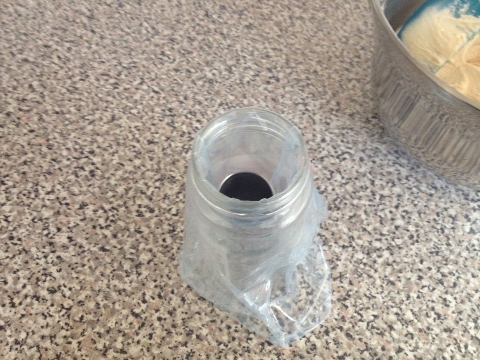 Fill a piping bag with the butter cream and decorate your cakes. I put my piping bag over a glass to be easier to fill it.