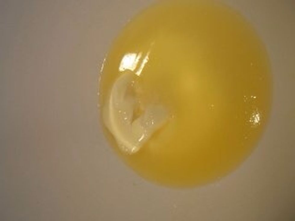 Fill a pot full of hot water place on medium to high heat, then place a bowl over it. Now the bowl should go into the water yet large enough to be able to sit alone and not allow the steam to come out