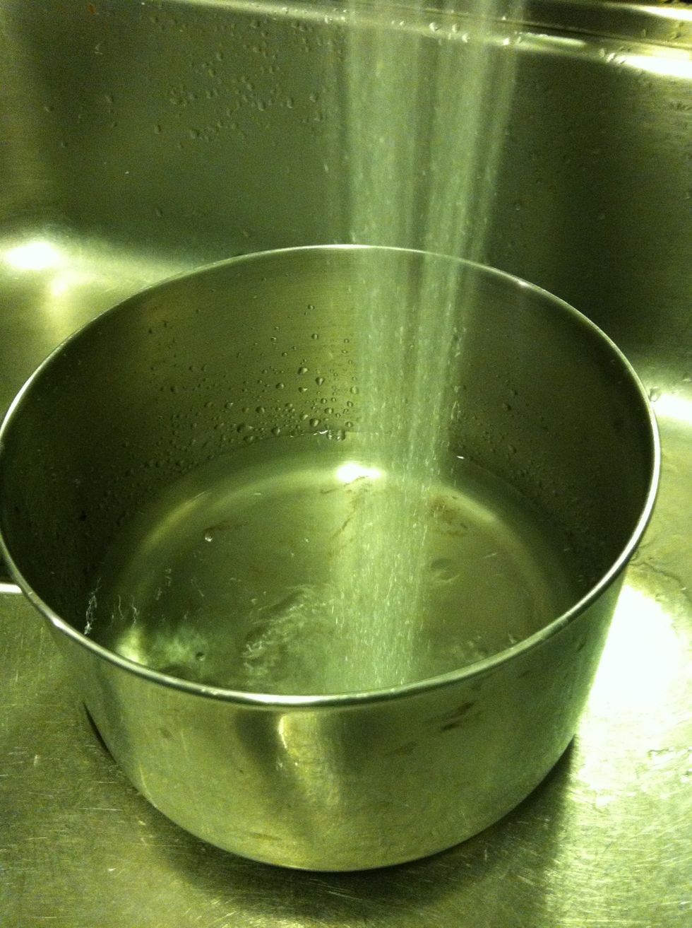 Fill a pot to a halfway point