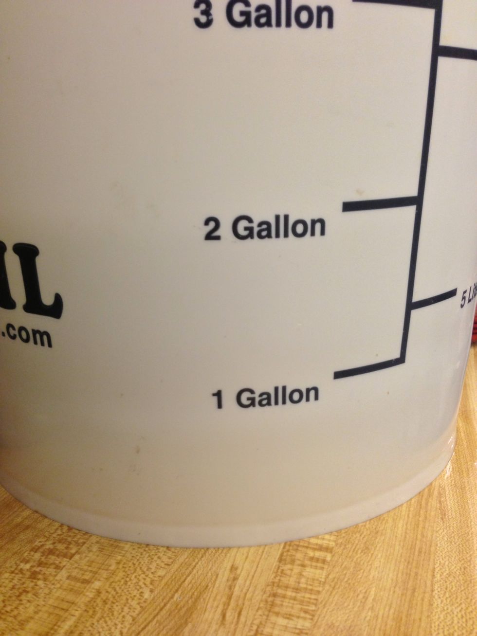 Fill bucket to the two gallon mark.