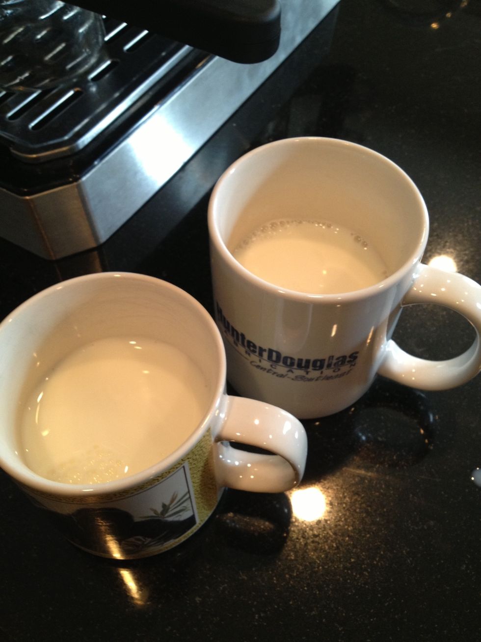 Fill cups half way with milk