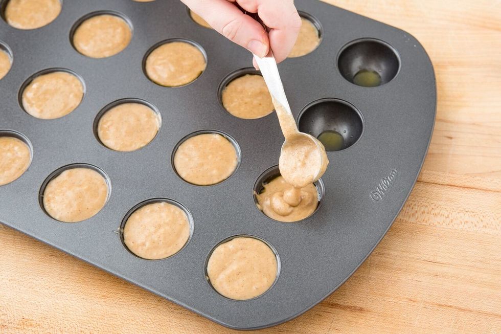Fill donut hole pans with a small teaspoon. Note: Try a tester batch first. You may need to use less batter to create perfect donut holes. Bake for 9-11 minutes.