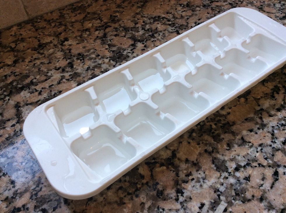 Fill each cube mould of an ice cube tray 1/3 with water and freeze it.