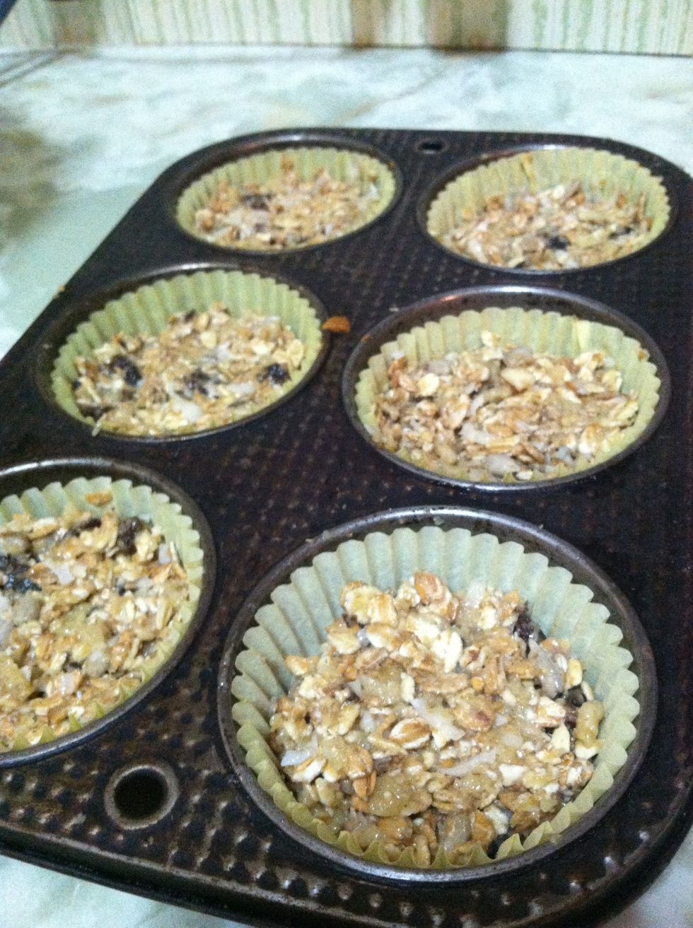 Fill each of the six paper baking cups half full with your mixture and make sure they're all the same size (as best you can)