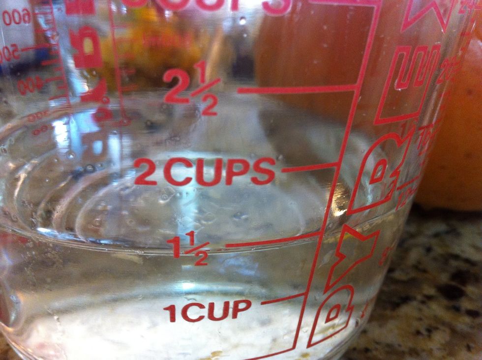 Fill empty pumpkin with water, then pour water into measuring bowl. This tells you how much stuffing you'll need to make. For the 2.5 pound pumpkin in this guide, we had 1 1/2 cups of stuffing.