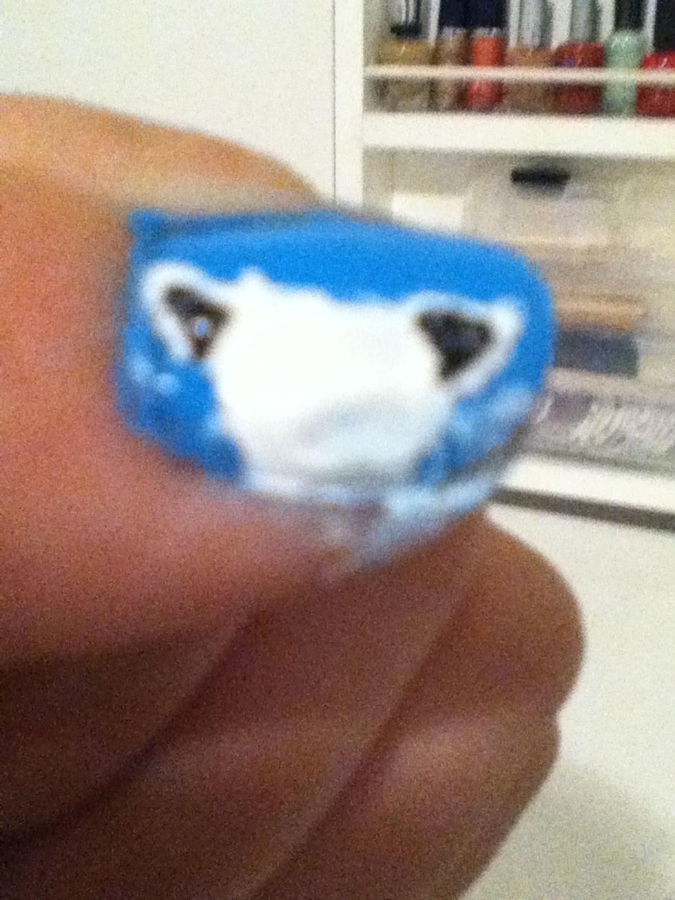 Fill in the ears with black