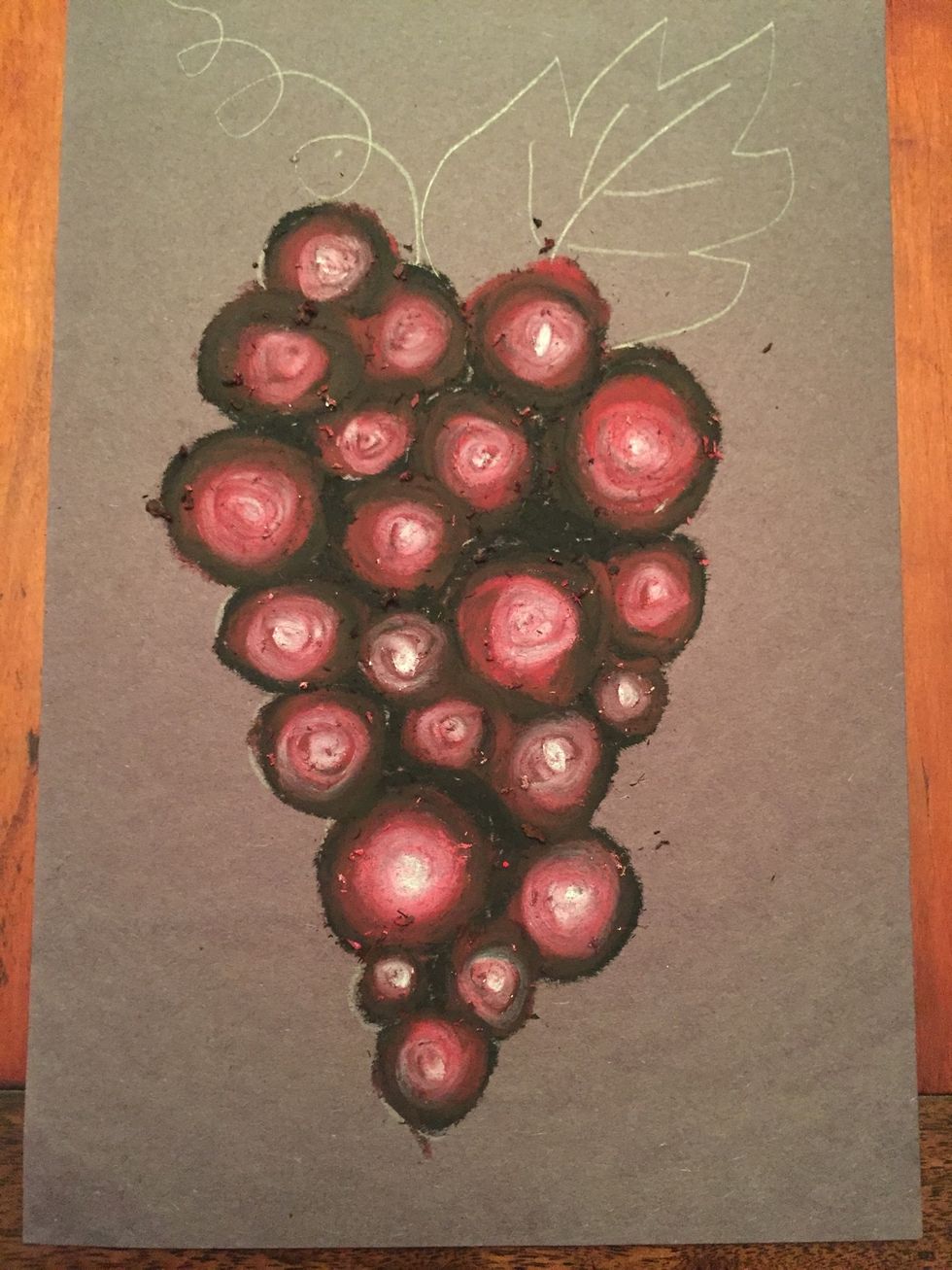 Fill in the gaps in between grapes with black.