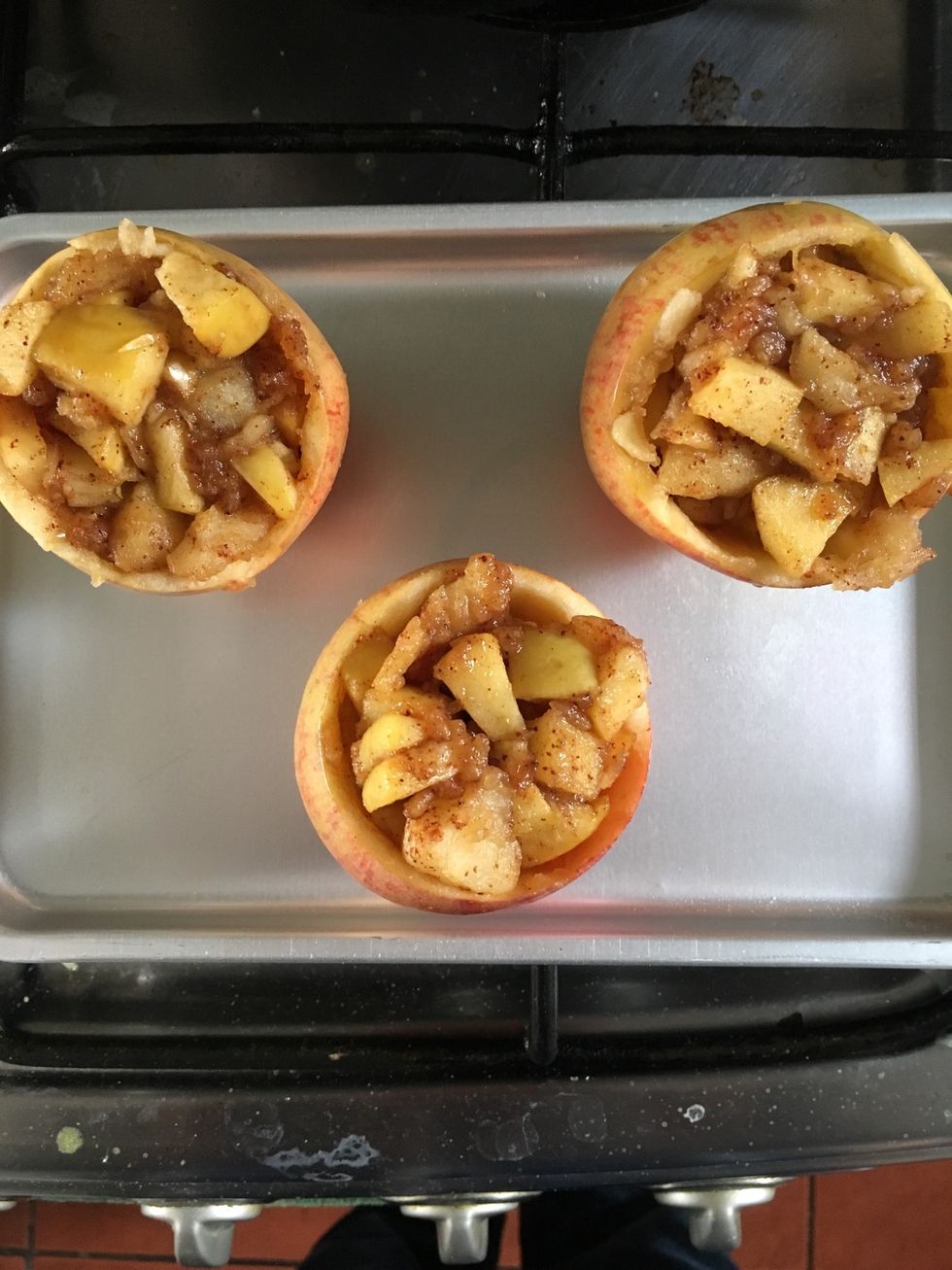 Fill in the hollow apples with the apple mixture