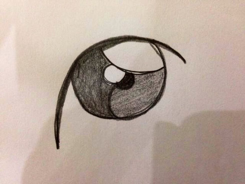 Fill in the other half area with a lighter greyish shade with your pencil.