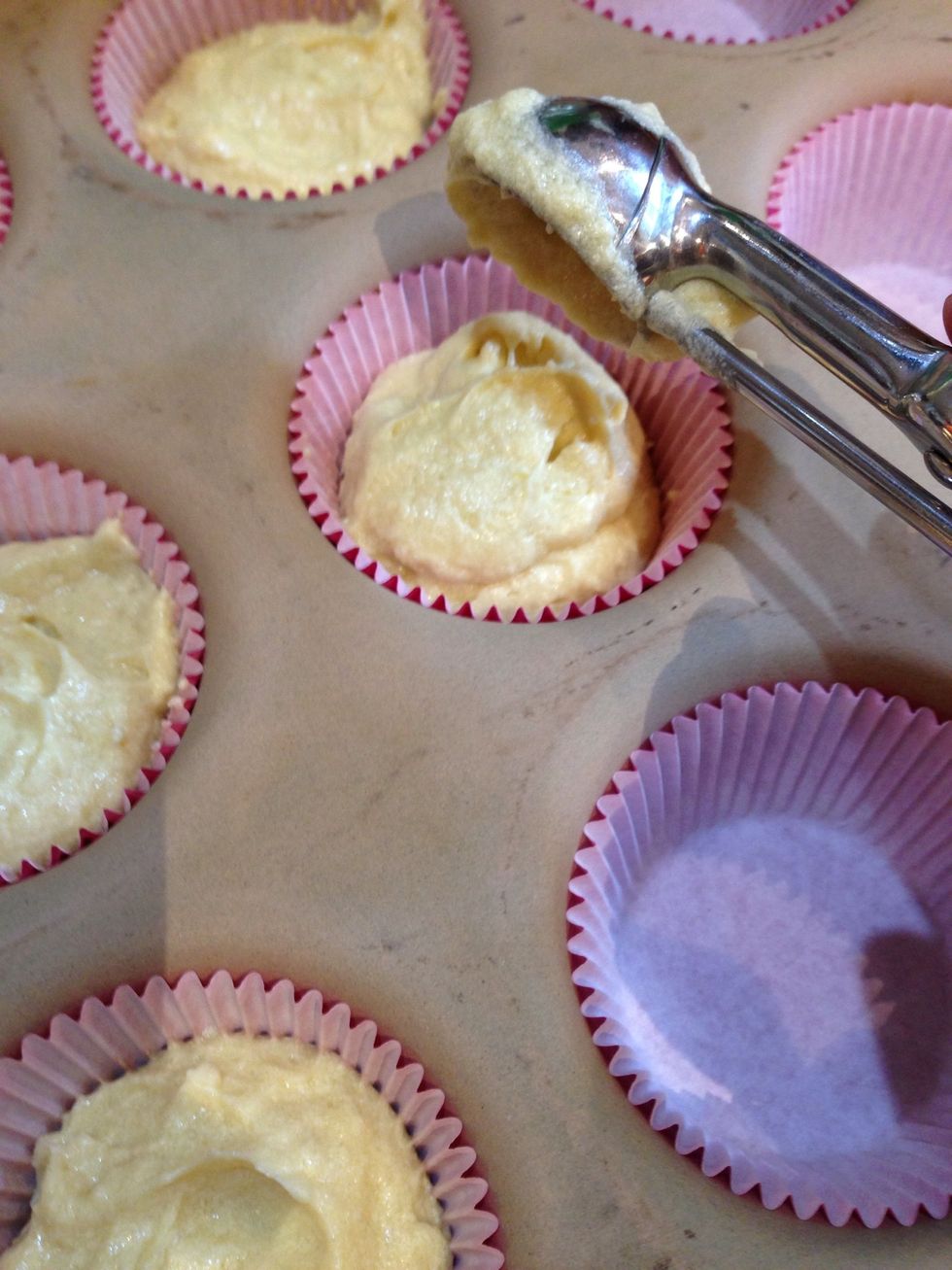 Fill it 2/3 full with batter. I used my little ice cream scoop. :)