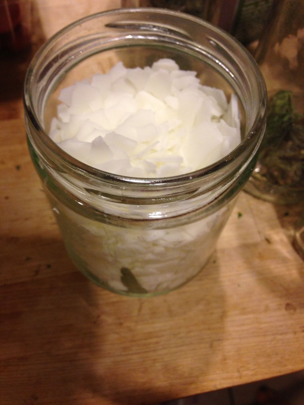 Fill jar with wax chips.